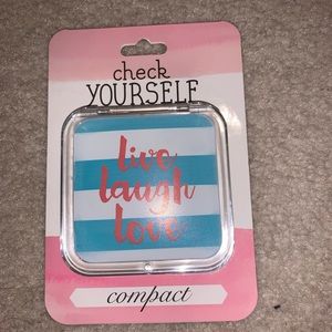 Cute makeup compact, magnified up to 5x